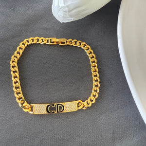 Bracelet - Gold chain black letters