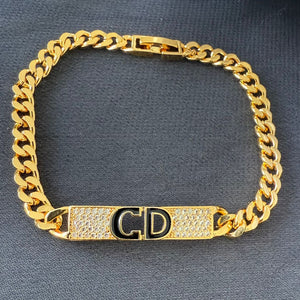 Bracelet - Gold chain black letters